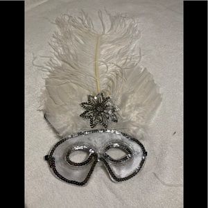 White feather mask